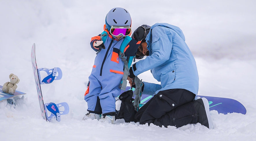 Teach children how to snowboard