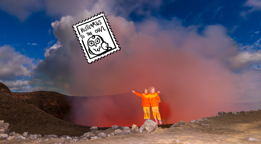 kids standing near a volcano