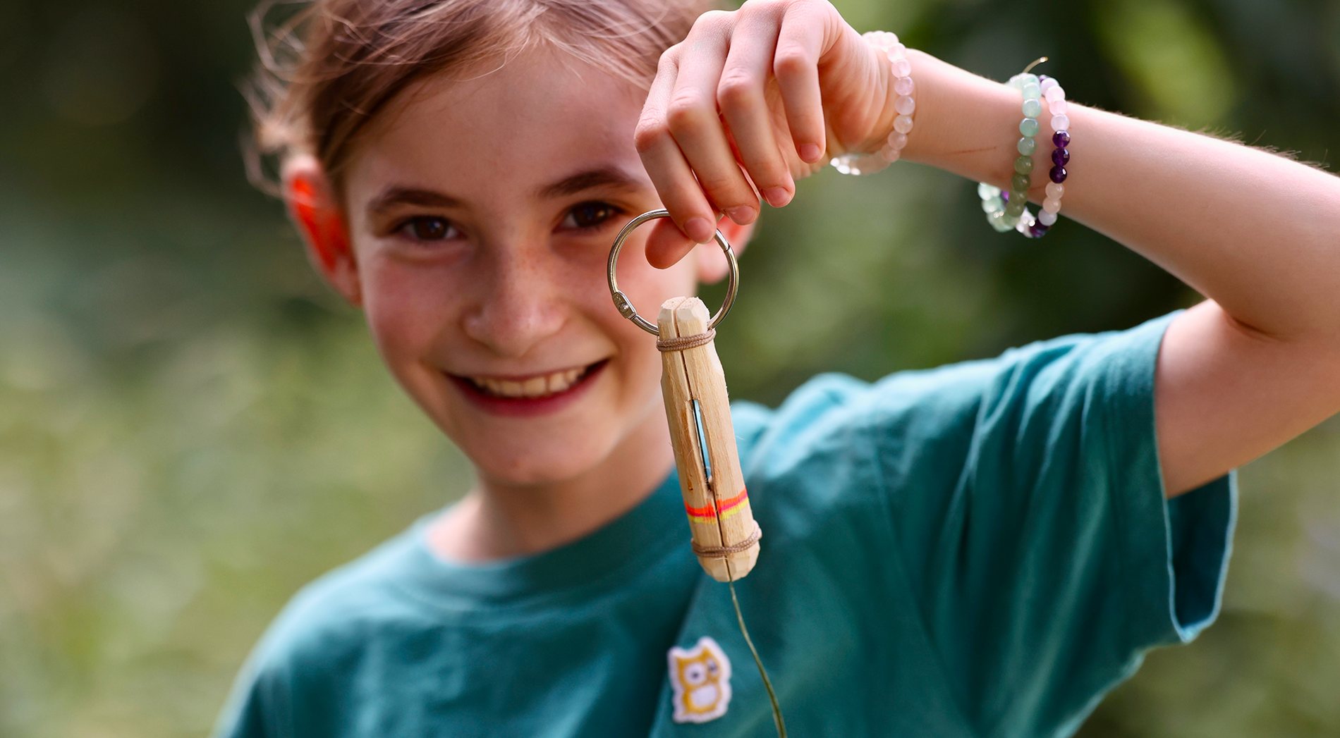 child showing a finished marmot whistle